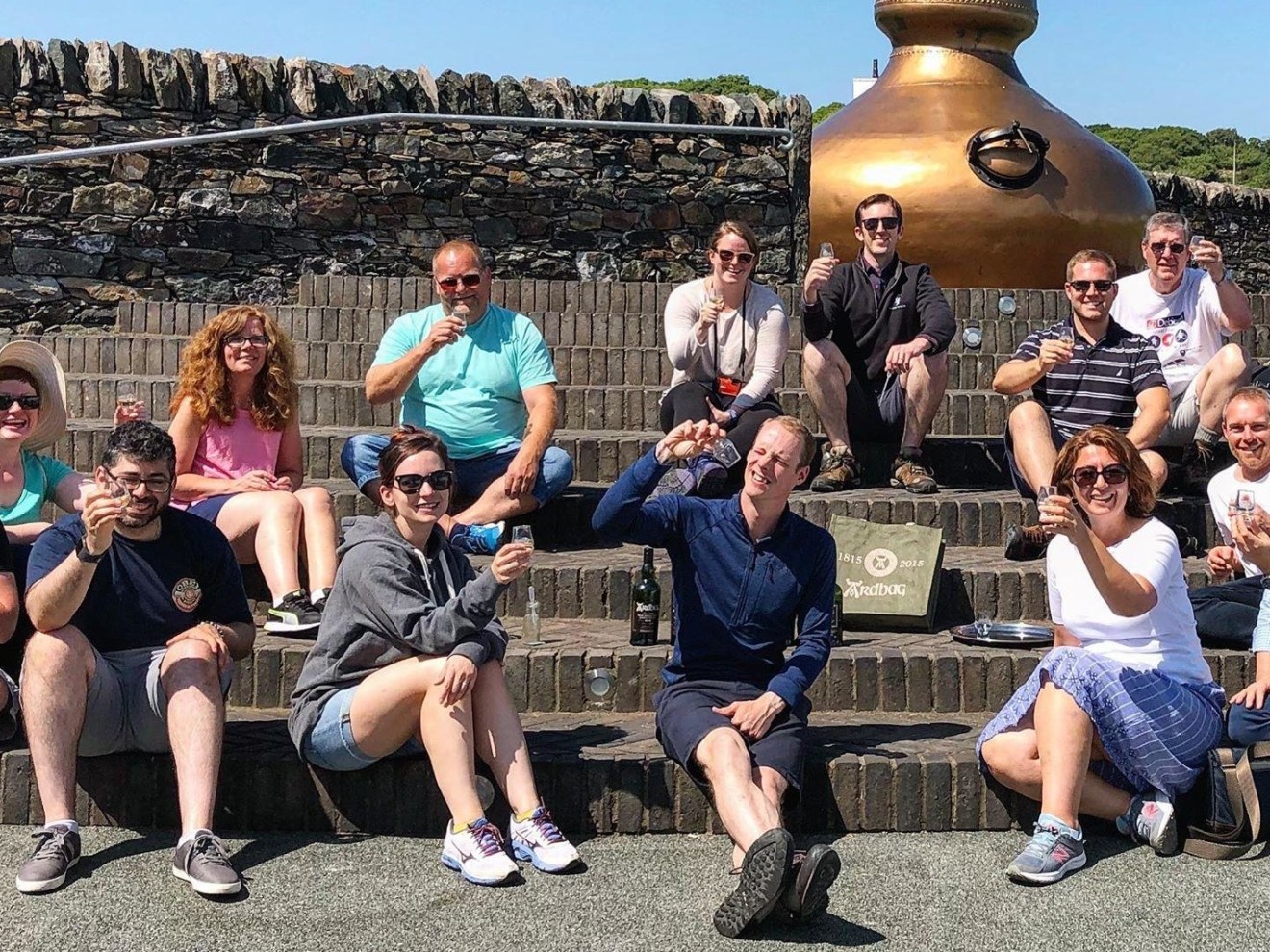 a group of people sitting on a bench